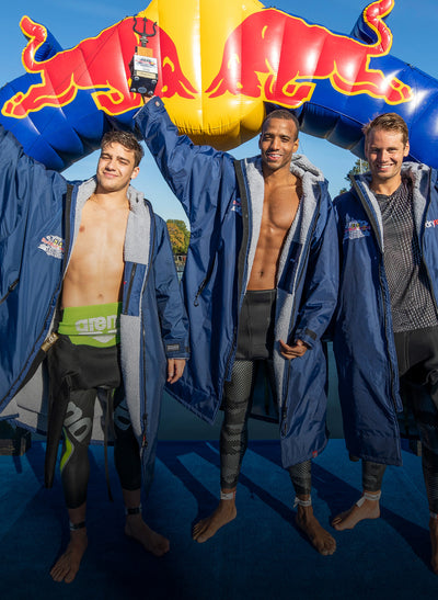 group of Red Bull competitors celebrating wearing dryrobes