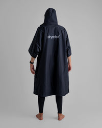 *MALE*  in studio wearing Tech-Lite Dryrobe®