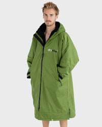 *MALE* wearing Forest Green dryrobe® Advance Long Sleeve, zipped up