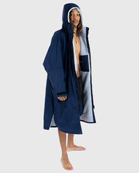 *MALE* wearing Navy Grey dryrobe® Advance Long Sleeve, unzipped with hood up