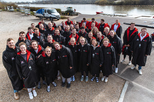Group shot of British Rowing in dryrobes 