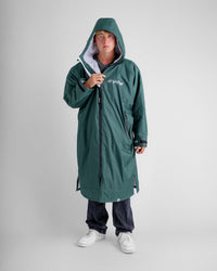*MALE* in studio wearing AW25 Green Dryrobe® advance long sleeve 