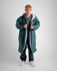 *MALE* in studio wearing AW25 Green Dryrobe® advance long sleeve 