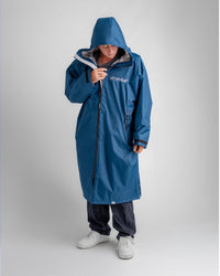*MALE* in studio wearing AW25 Blue Dryrobe® advance long sleeve 
