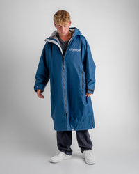 *MALE* in studio wearing AW25 Blue Dryrobe® advance long sleeve 
