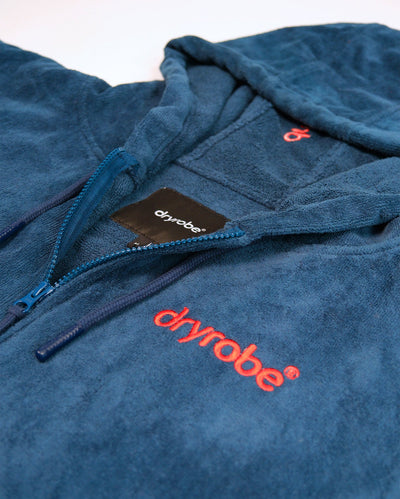Female detail shot of Dryrobe® Zip towel (blue orange)