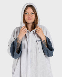 Adult female in studio wearing Dryrobe® Zip towel (nimbus cloud)