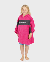 Child wearing Kids Organic Towel dryrobe - Remix in Pink Slate Grey 