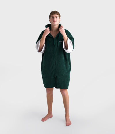 *MALE* Person wearing a green hooded garment on a white background