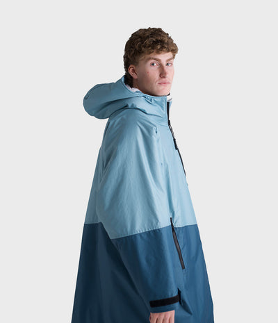 *MALE* Person wearing a blue Dryrobe on a white background