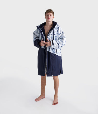 *MALE* Person wearing a two-tone Dryrobe with a hood on a white background