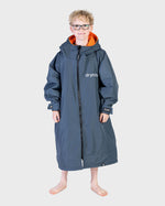 Boy wearing dryrobe Advance Long Sleeve Changing poncho in Dark Grey Orange 