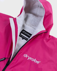 Close up of logo on dryrobe Advance Long Sleeve Changing poncho in Pink Light Grey 