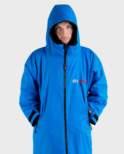 *MALE* wearing Cobalt Blue Black dryrobe® Advance Long Sleeve with hood up