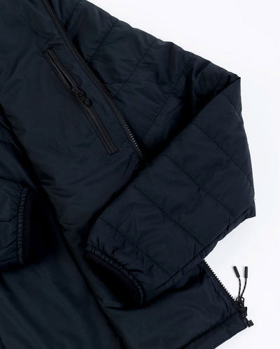 Close up of sleeve and inner pocket on dryrobe Mid-Layer Jacket in Black