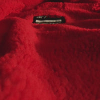 Close up of inner red lining and waterproof outer shell of dryrobe® Advance 