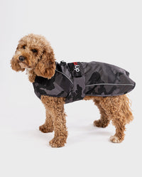1|Cockapoo standing wearing Black Camo dryrobe® Dog