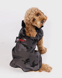 1|Cockapoo sat with back to the camera wearing Black Camo dryrobe® Dog
