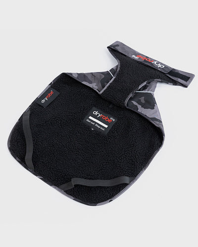 1|Black Camo dryrobe® DogDog laid flat, showing the inner lining