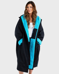 1|Woman wearing Black Blue dryrobe® Advance Long Sleeve unzipped