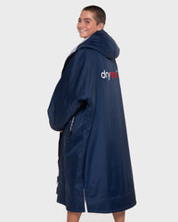 1|Woman wearing  Navy Grey dryrobe® Advance Long Sleeve with back to the camera