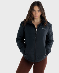 Woman wearing dryrobe® Mid-layer Jacket zipped up