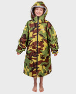 Girl wearing Camo Grey Kids dryrobe® Advance Long Sleeve changing poncho with hood up