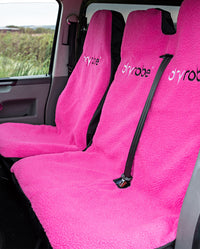 1|Single and double Pink dryrobe® Water-repellent Car Seat Covers shown in a van